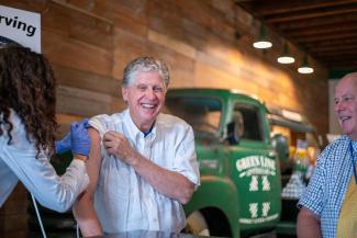 Governor McKee gets flu shot in Providence.
