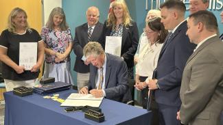 Governor McKee ceremonially signs health care legislation